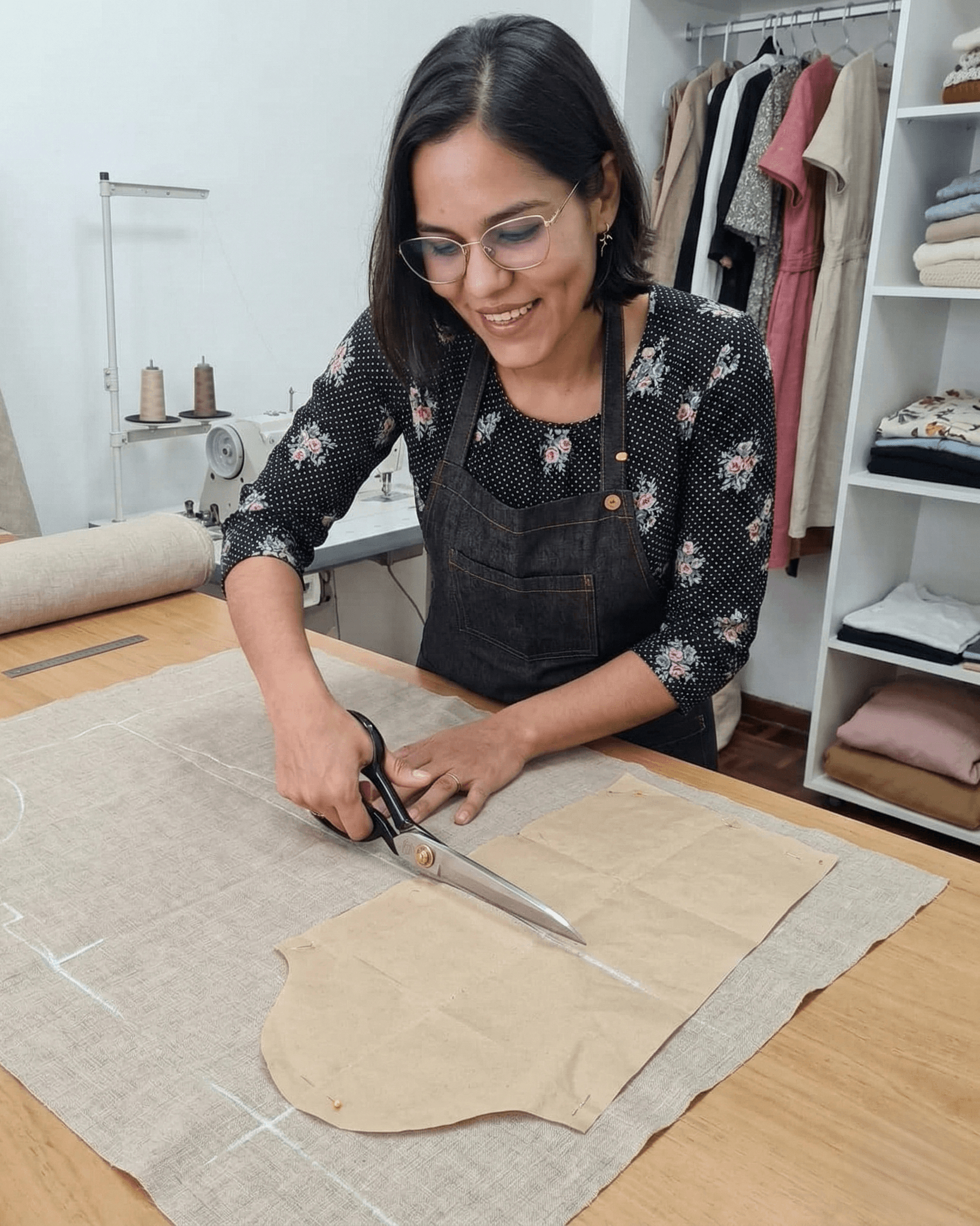 Artisan cutting the linen fabric to make a shirt